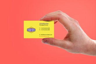 Hand Holding Business Card Mockup