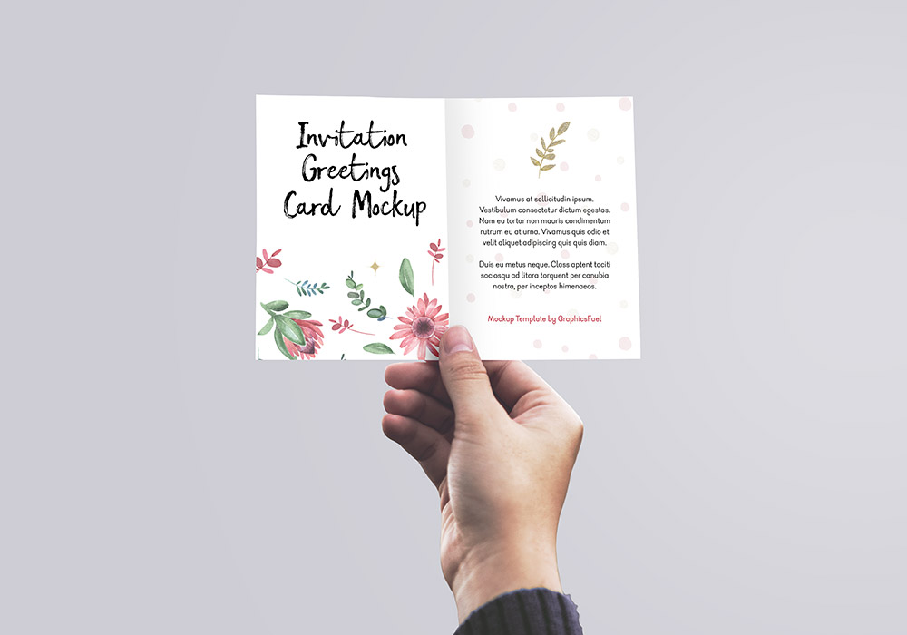 Invitation / Greeting Card in Hand Mockup PSD