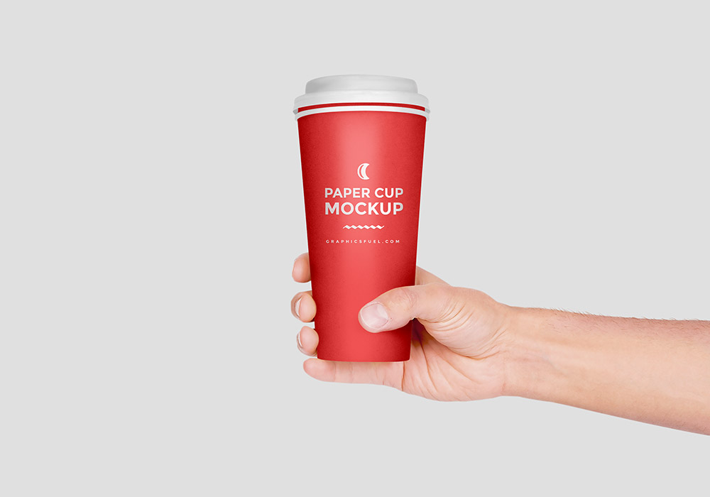 Paper Cup In Hand Mockup PSD