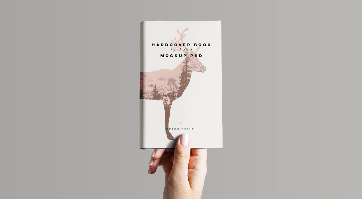 Hardcover Book In Hand Mockup